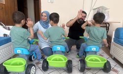 Koruyucu ailesi oldukları üçüzlerle evlerini şenlendirdiler